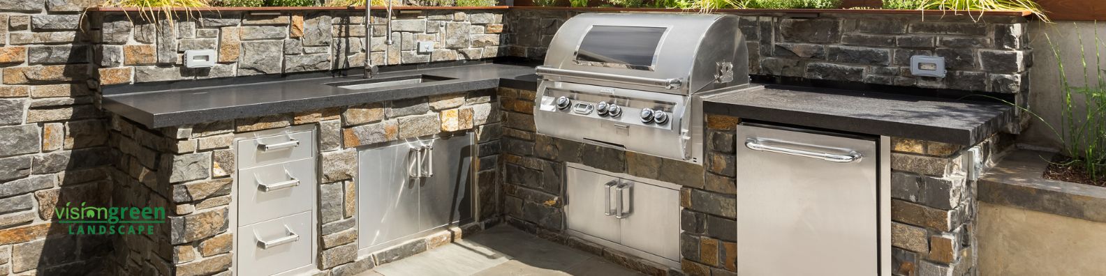 Outdoor kitchen and backyard living space in Charlotte
